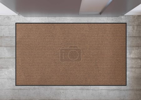 Blank brown door mat on concrete floor, perfect for showcasing custom designs or logos in an urban home setting. Welcome mat with copy space. Doormat mock up. Carpet at entrance. 3D