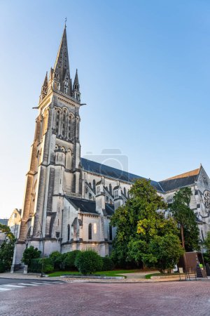 Photo for Huge tower of the medieval church of St. Martin in the center of the tourist city of Pau, France - Royalty Free Image