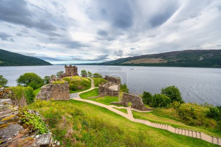 Photo for Great panorama of Loch Ness with Urquhart Castle on a hill by the loch, Scotland - Royalty Free Image