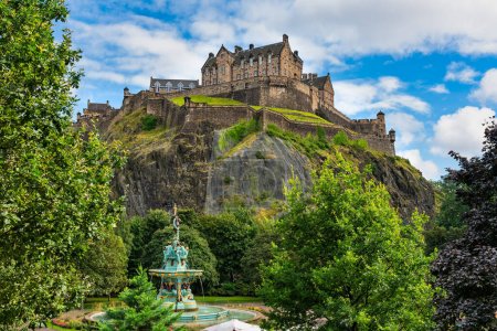 Photo for View of Edinburgh Castle from the gardens at the foot of the hill, Scotland, UK - Royalty Free Image