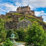 View of Edinburgh Castle from the gardens at the foot of the hill, Scotland, UK