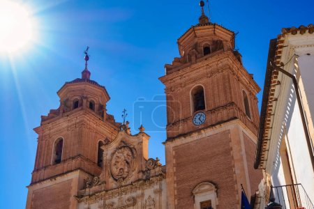 Photo for Tall towers of the huge church of the Immaculate Mary in the Andalusian village of Velez Rubio, Almeria - Royalty Free Image