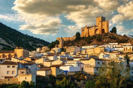 Photo for White village of Velez Blanco at dawn with its hilltop castle dominating the surroundings, Andalusia - Royalty Free Image