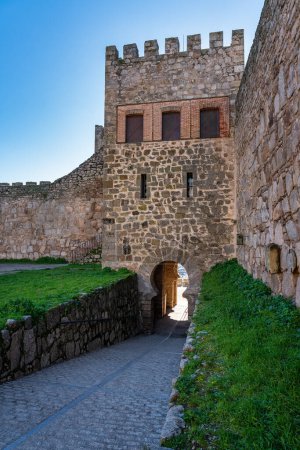 Stone tower leading to the medieval citadel castle of the monumental city of Trujillo, Spain