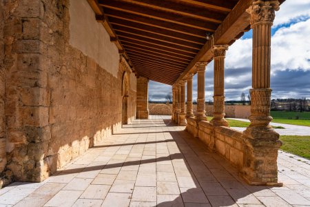 Arcades with medieval stone columns in an old church near Aranda de Duero, Spain.