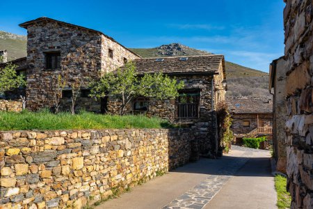 Picturesque streets with stone houses next to the mountains in Guadalajara, Valverde