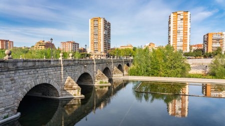 Skyline of the city of Madrid next to the bridge that crosses the Manzanares River to the south of the city