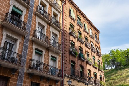 Balconies of old houses next to the park of the temple of Debod, in Madrid