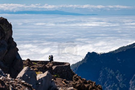 Stunning scenery with a sea of clouds below covering the sea, Canary Islands, La Palma
