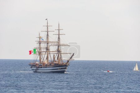 Photo for 01 07 2023, Genova, Italia. The ship Amerigo Vespucci, known as The most beautiful in the world leaves from the port of Genova for the tour around the globe. - Royalty Free Image