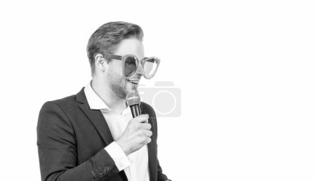 Photo for Master of ceremony. Emcee isolated on white. Emcee or conferencier in funny glasses. Speaker speak to microphone. Dedicated to speaking out, copy space. - Royalty Free Image