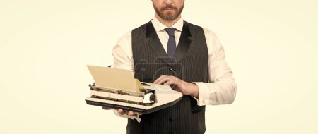 Photo for Cropped secretary man typing on vintage typewriter, journalism. - Royalty Free Image