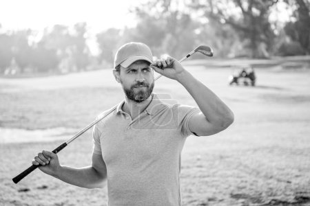 portrait of golfer in cap with golf club in cap, sport.