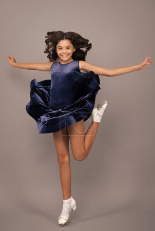 Photo for Happy girl face, positive and smiling emotions. Happiness, activity and child. Teenager girl jumping on isolated background. Full length, energetic little girl jumping in air, child flying up - Royalty Free Image