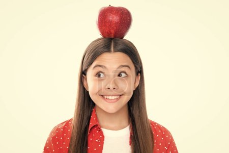 Photo for Fresh big red apple. Teenager girl hold apples on white isolated studio background. Child nutrition. Portrait of happy smiling teenage child girl - Royalty Free Image