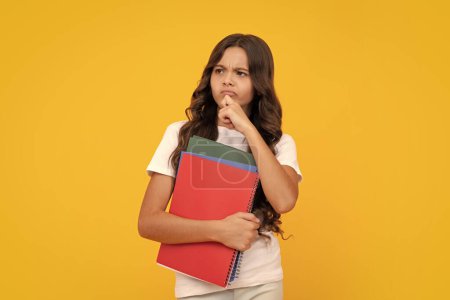 Photo for Teenager school girl study with books. Learning knowledge and kids education concept. Thinking pensive clever teenager girl - Royalty Free Image