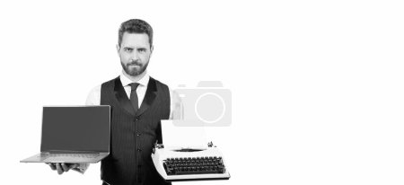 Photo for Man showing laptop and typewriter isolated on white background, copy space, technology. - Royalty Free Image