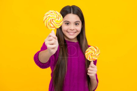 Photo for Teenage girl with lollipop, child eating sugar lollipops, kids sweets candy shop - Royalty Free Image