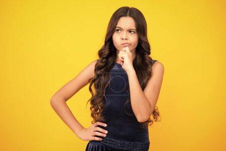 Photo for Thinking face, thoughtful emotions of teenager girl. Little kid girl 12,13, 14 years old on isolated background. Children studio portrait. Emotional kids face - Royalty Free Image