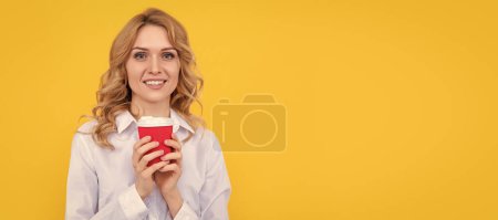 Photo for Glad blonde woman with morning coffee cup on yellow background. Woman isolated face portrait, banner with mock up copy space - Royalty Free Image