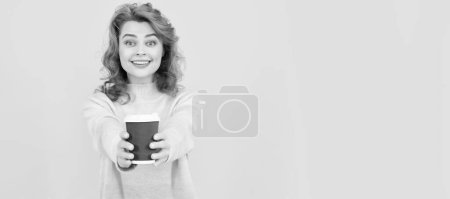 Photo for Take this. happy red haired woman drink coffee. take away beverage. cheerful girl drinking tea. Woman isolated face portrait, banner with copy space - Royalty Free Image
