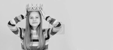 selfish teen child in queen crown on yellow background. Child queen princess in crown horizontal poster design. Banner header, copy space