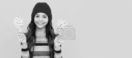 cheerful teen girl with lollipop candy, dental care.