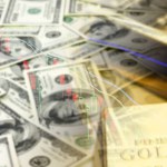 Currency and gold with diagram, abstract and concept of investment and stock market candlestick diagram, blurred dollars and gold background