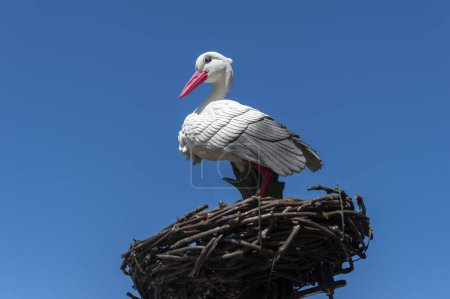 Photo for Staged stork in city center of Rosheim, symbolic image for Alsace. Bas-Rhin department in Alsace region of France - Royalty Free Image
