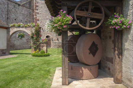 Historic community wine press and former city wall in Westhoffen. Bas-Rhin department in Alsace region of France