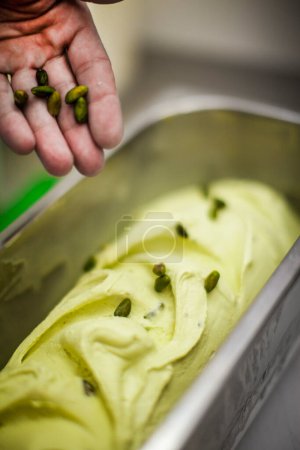 Photo for Tub of pistachio ice cream - Royalty Free Image
