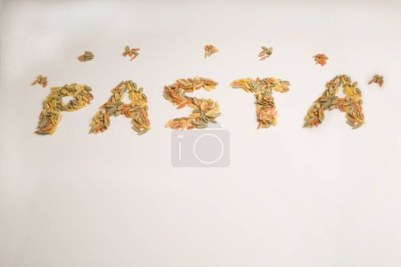 Photo for Written pasta with malloreddus on a white table - Royalty Free Image
