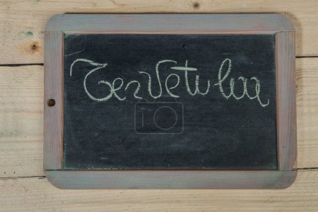 Photo for A chalk board with a word " i written in " - Royalty Free Image