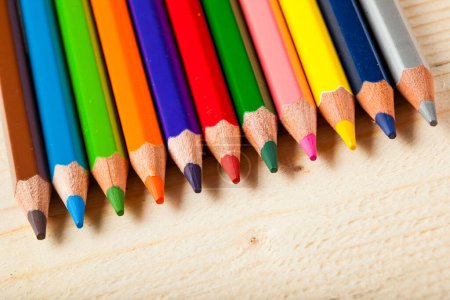 Photo for Colored pencils on wood background - Royalty Free Image