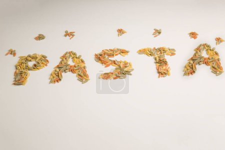 Photo for Written pasta with malloreddus on a white table - Royalty Free Image
