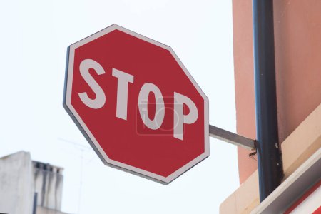 Photo for Stop road sign in urban context - Royalty Free Image