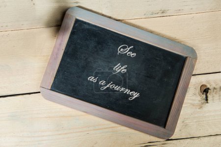 Photo for 'See life as a journey' on chalkboard - Royalty Free Image
