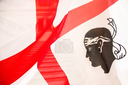 Photo for Flag of Sardinia with the detail of one of the four moors - Royalty Free Image