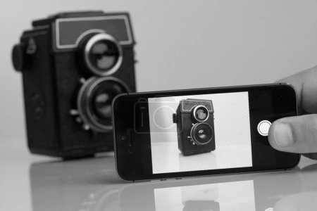 Photo for Vintage camera and old phone - Royalty Free Image