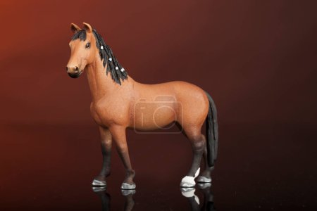 Photo for Horse toy on a dark background - Royalty Free Image