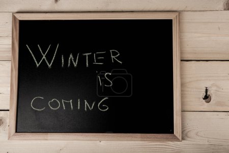 Téléchargez les photos : Tableau noir avec texte "L'hiver arrive" - en image libre de droit