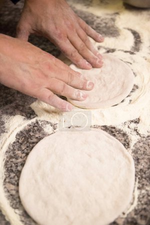 Photo for Woman making pizza dough - Royalty Free Image