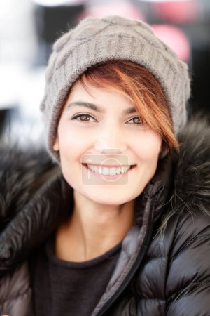 Photo for Portrait of beautiful smiling girl with cap and coat - Royalty Free Image