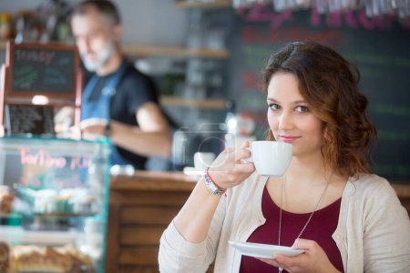 young woman in coffee shop
