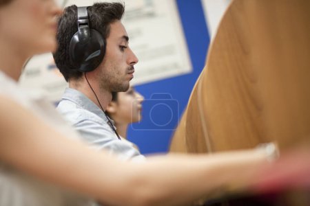 Photo for Call center operator works at his workstation - Royalty Free Image