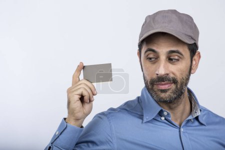 Photo for Delivery man with gray hat isolated on gray background - Royalty Free Image