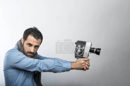 Photo for Man with vintage video camera - Royalty Free Image
