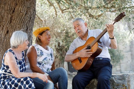 Photo for Elderly couple playing guitar - Royalty Free Image