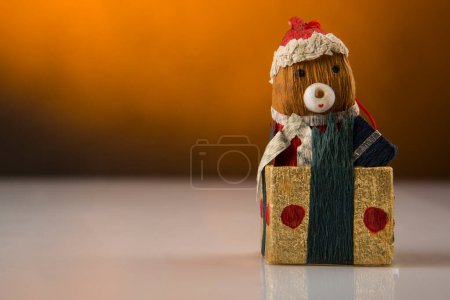 Photo for Christmas wooden toy figurine on a wooden background - Royalty Free Image