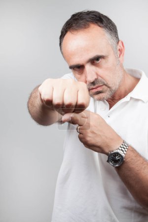 Photo for Angry middle aged man in shirt - Royalty Free Image